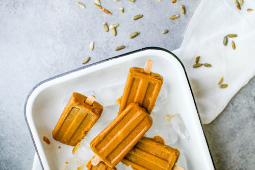 Delicious Vegan Pumpkin Popsicles for Halloween.