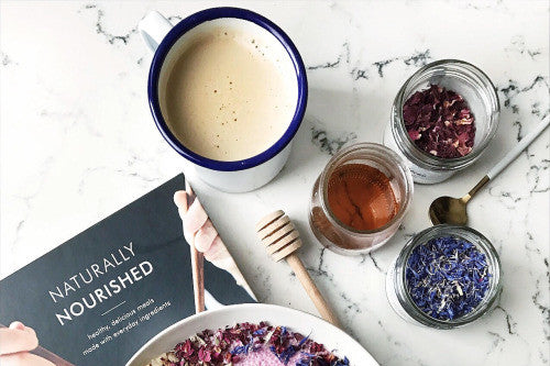 COCONUT CHIA PUDDING WITH BERRIES AND GRANOLA.