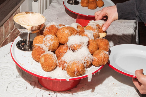 Falcon x Naughty Nonnas : Cacio e Pepe Arancini.
